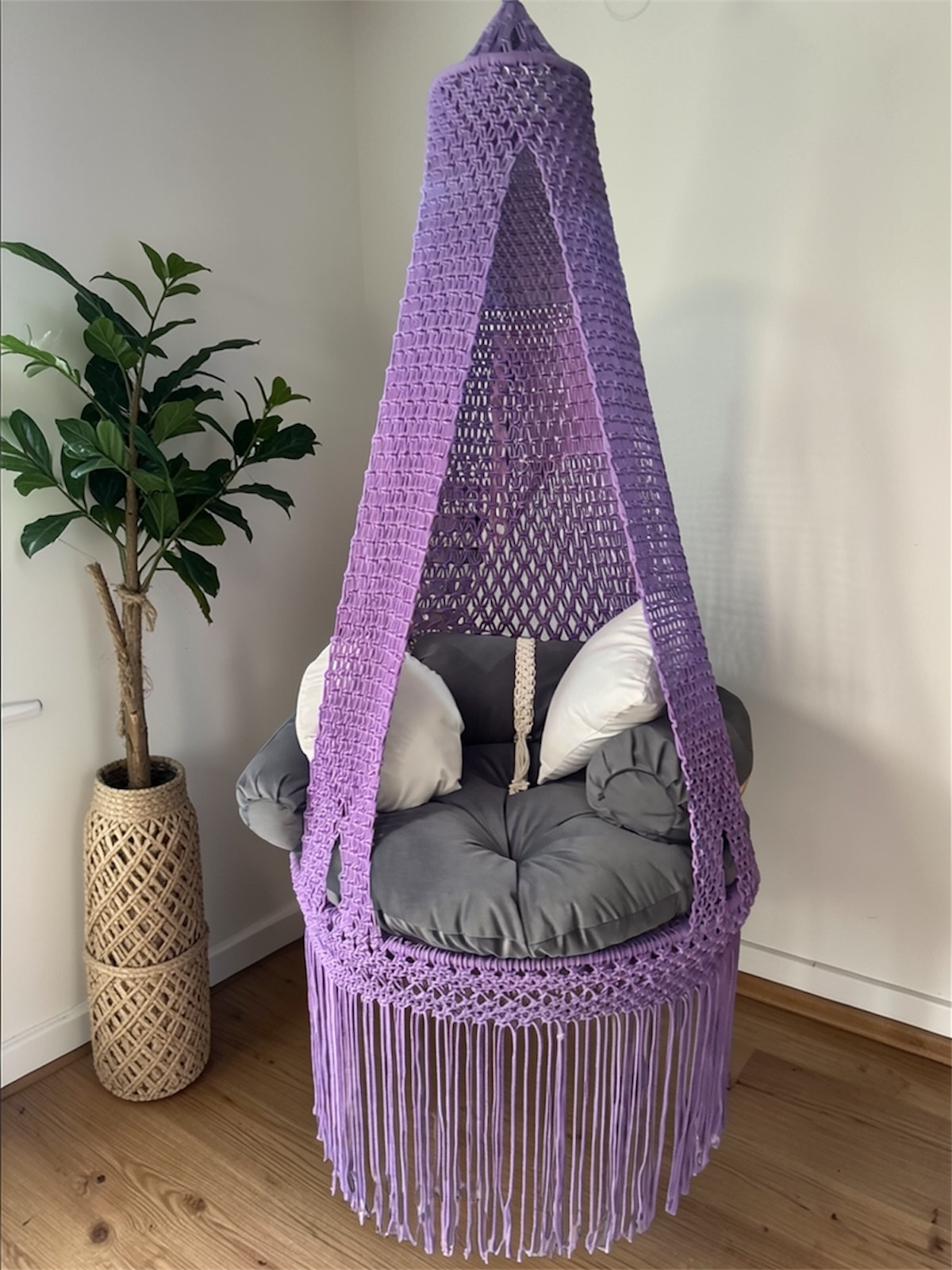 Purple macrame hanging swing